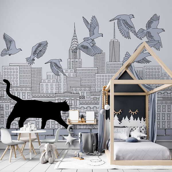 Kat loopt op een muur met vliegende vogels in de lucht Kat loopt op een muur met vliegende vogels in de lucht
