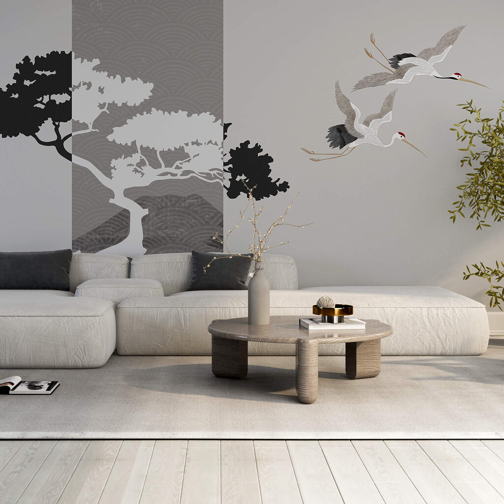 Een paar kraanvogels vliegen naast een boom Een paar kraanvogels vliegen naast een boom