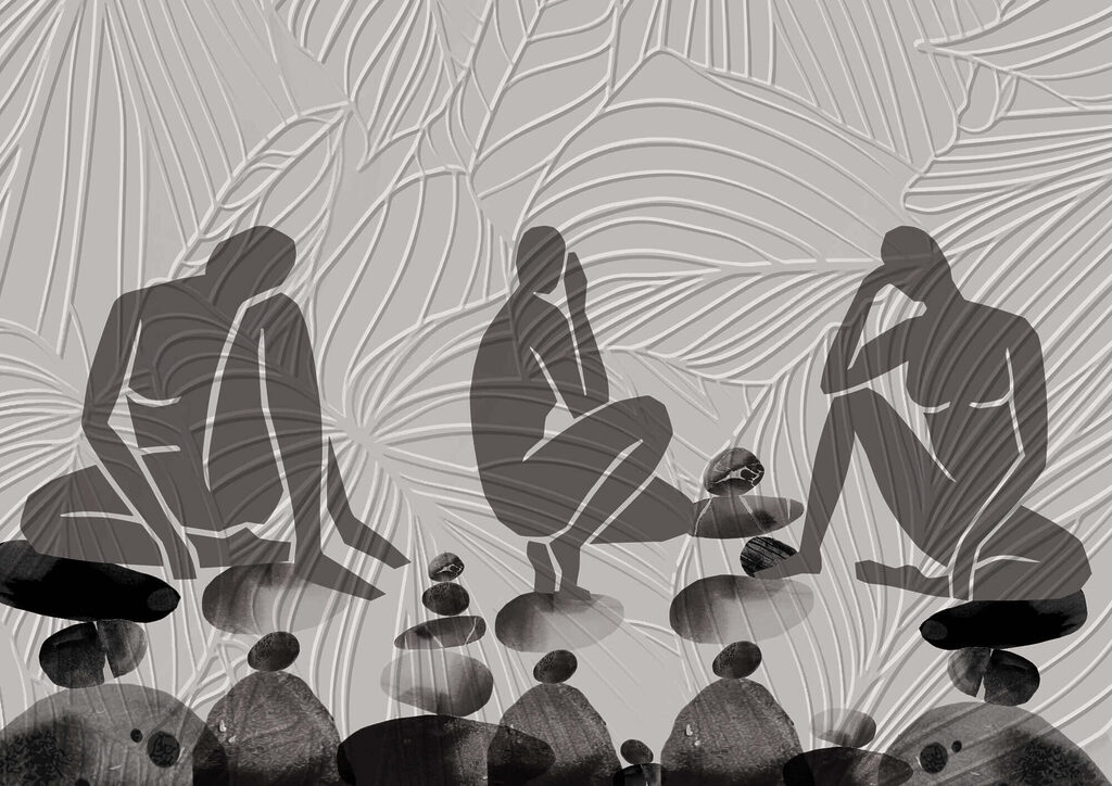 Group of people sitting on rocks Group of people sitting on rocks