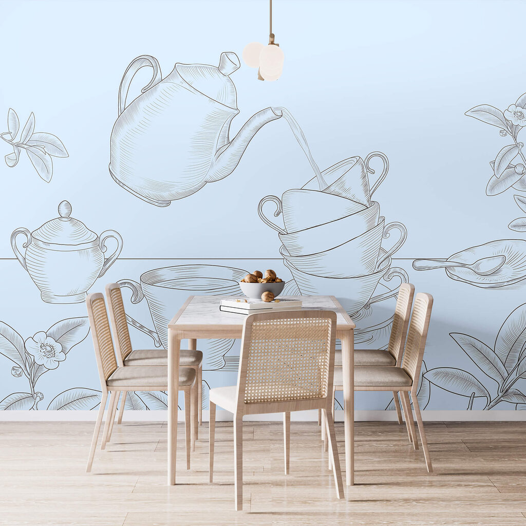 Theepot die in een stapel theekopjes schenkt