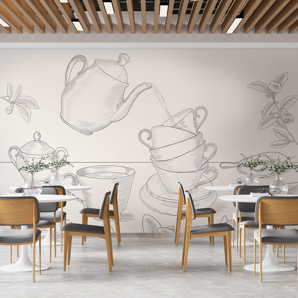 Theepot die in een stapel theekopjes schenkt Theepot die in een stapel theekopjes schenkt