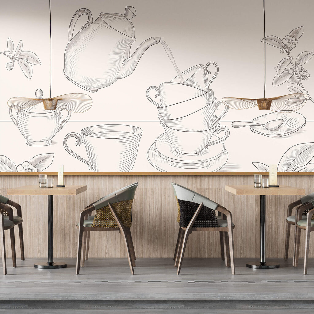 Theepot die in een stapel theekopjes schenkt Theepot die in een stapel theekopjes schenkt