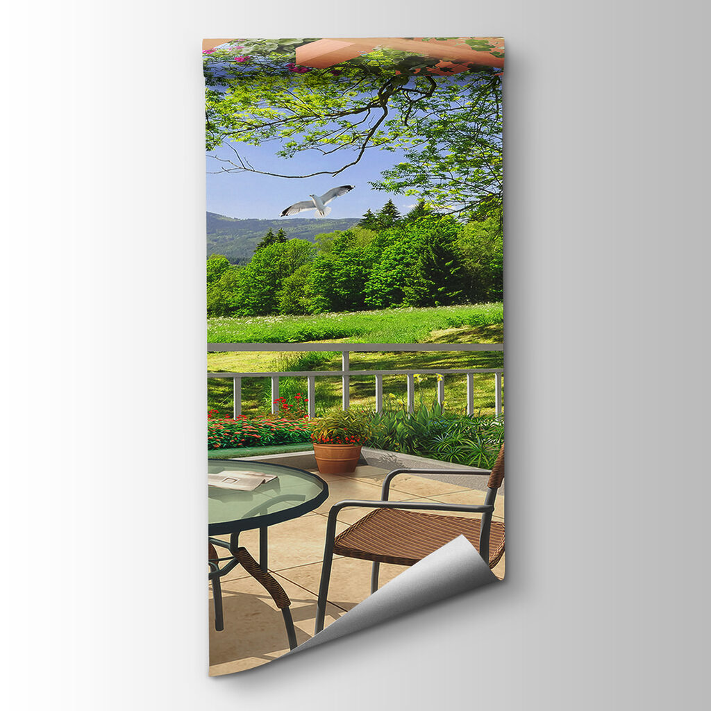 Patio with a table and chairs and a view of a green field