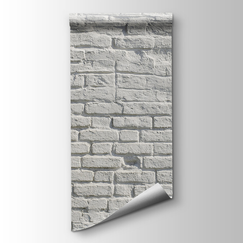 White brick wall with black spots
