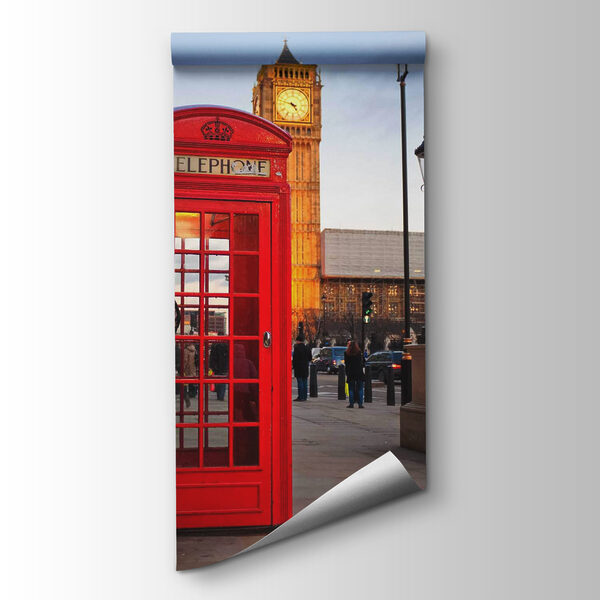 Red telephone booth in a city