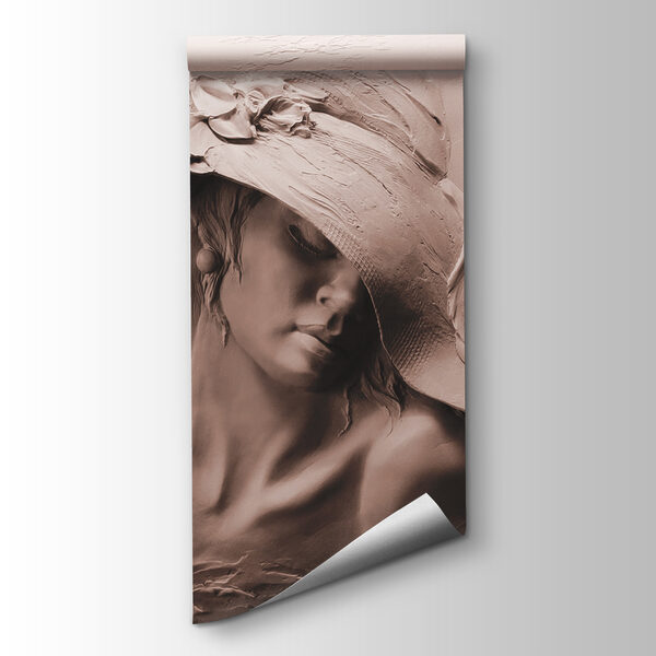 A sculpture of a woman in a hat A sculpture of a woman in a hat