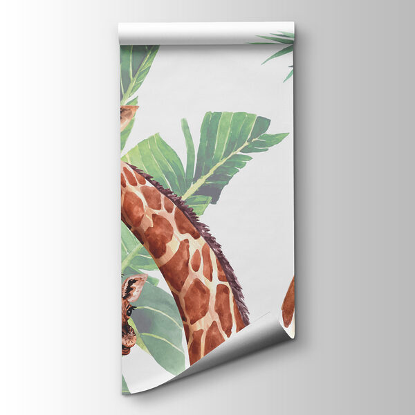 A group of giraffes with their heads in front of leaves