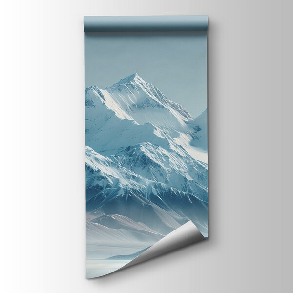 Snowy mountain range with a body of water