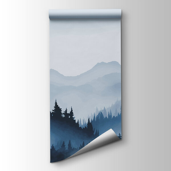 Foggy mountain landscape with trees and mountains