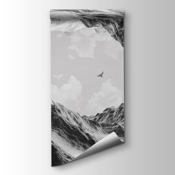 Group of birds flying over a mountain