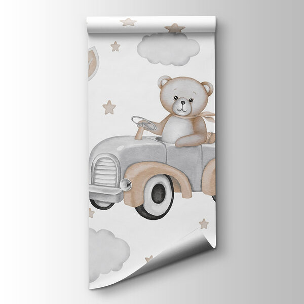 Teddy bear driving a car with balloons Teddy bear driving a car with balloons