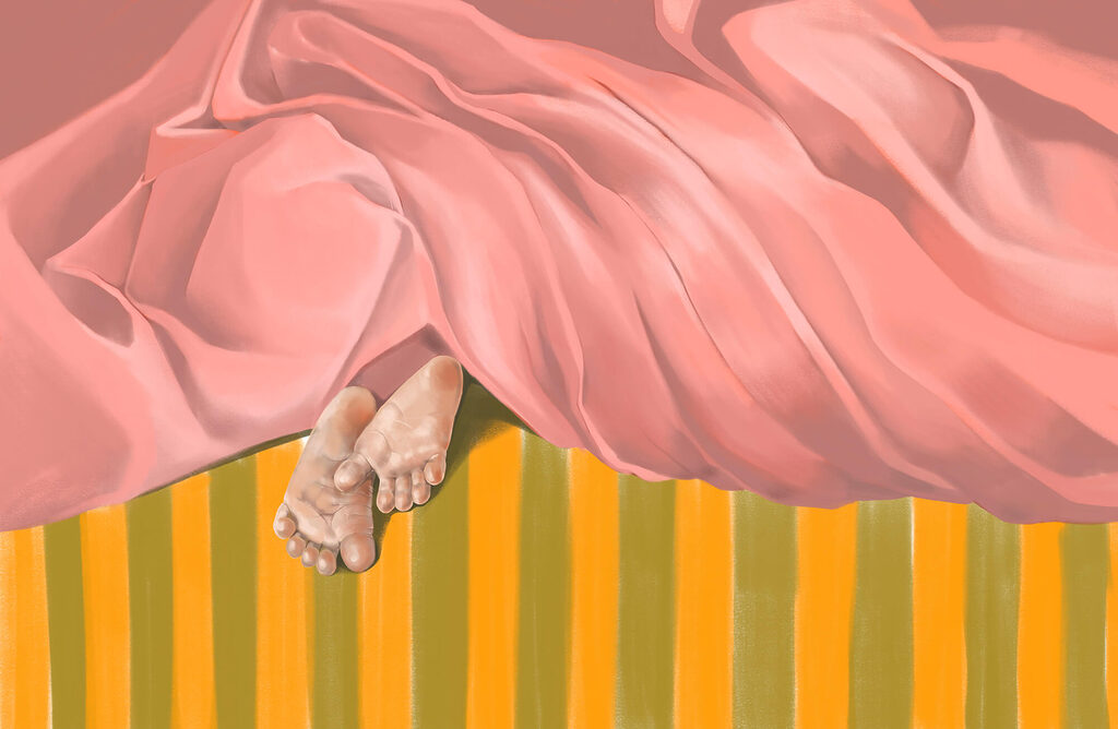 Pair of feet under a pink blanket Pair of feet under a pink blanket