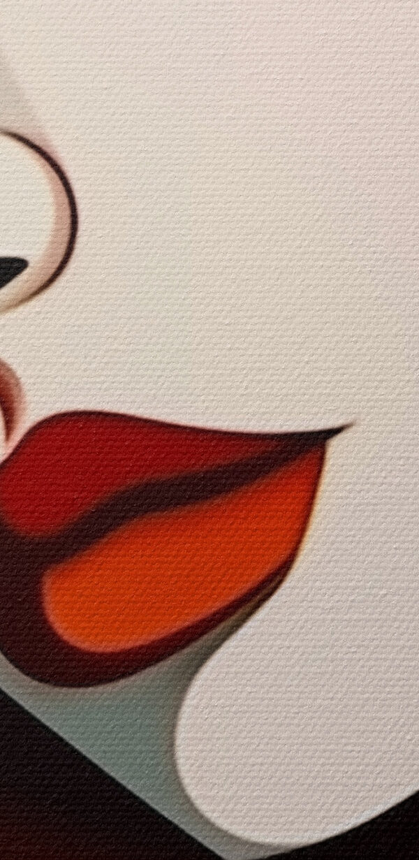 Woman's face with red lips and black hair