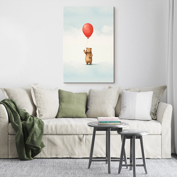 Bear holding a red balloon
