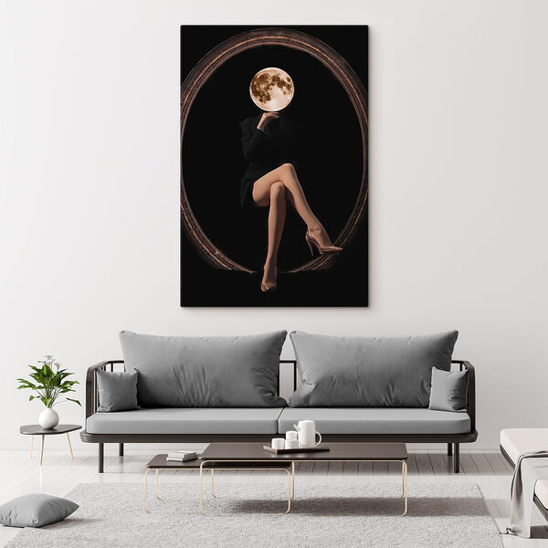 Woman sitting in a chair with a moon in her face