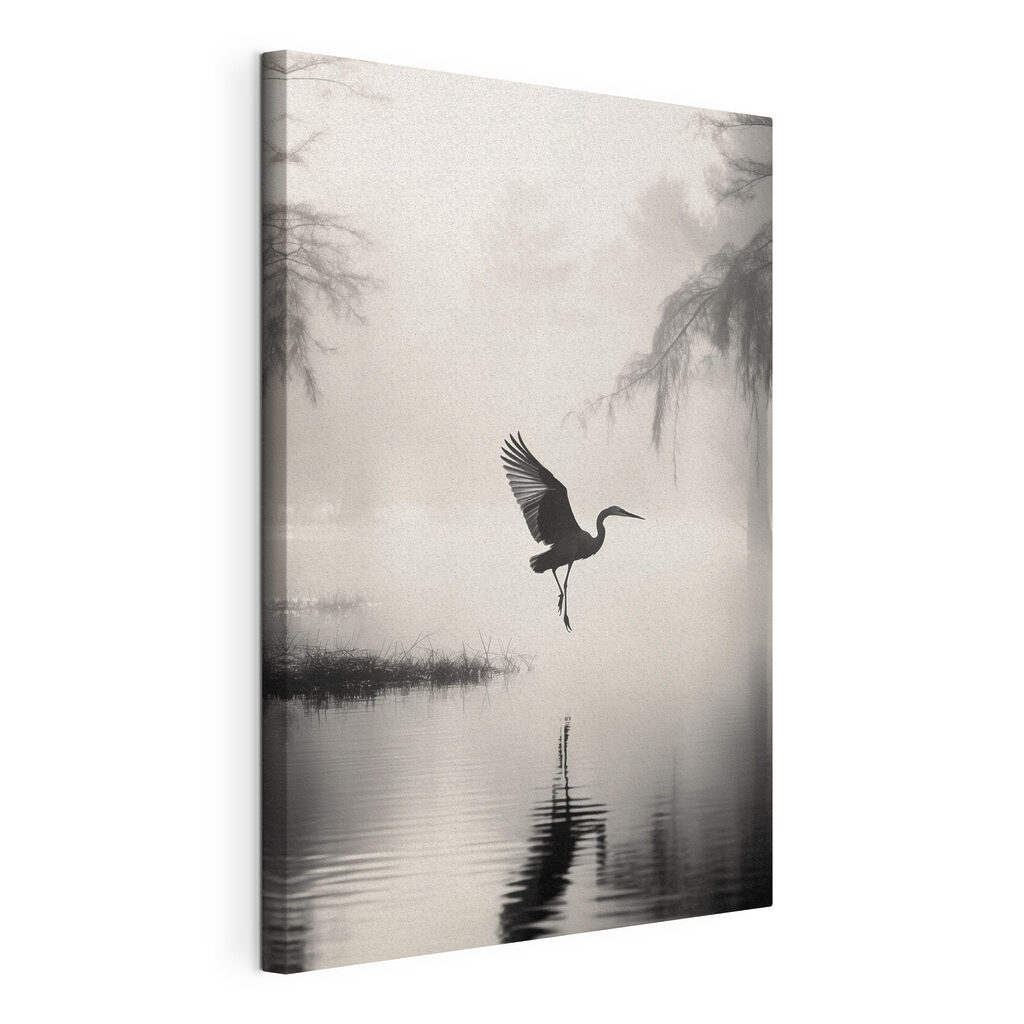 Bird flying over water
