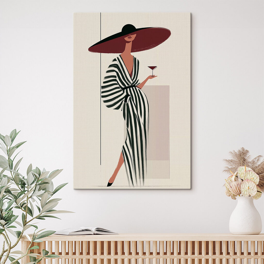 Woman in a striped dress holding a glass of wine Woman in a striped dress holding a glass of wine