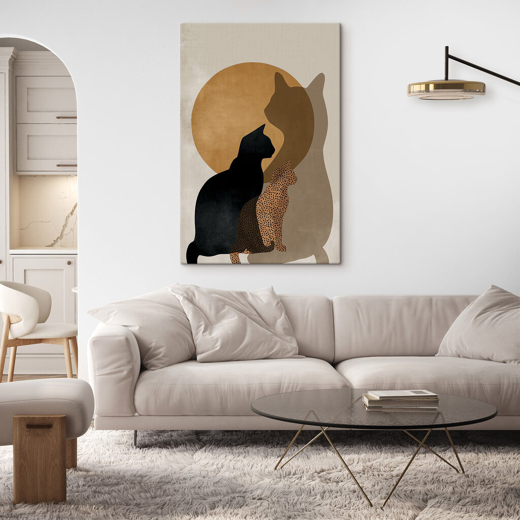 Cat silhouettes in front of a circle