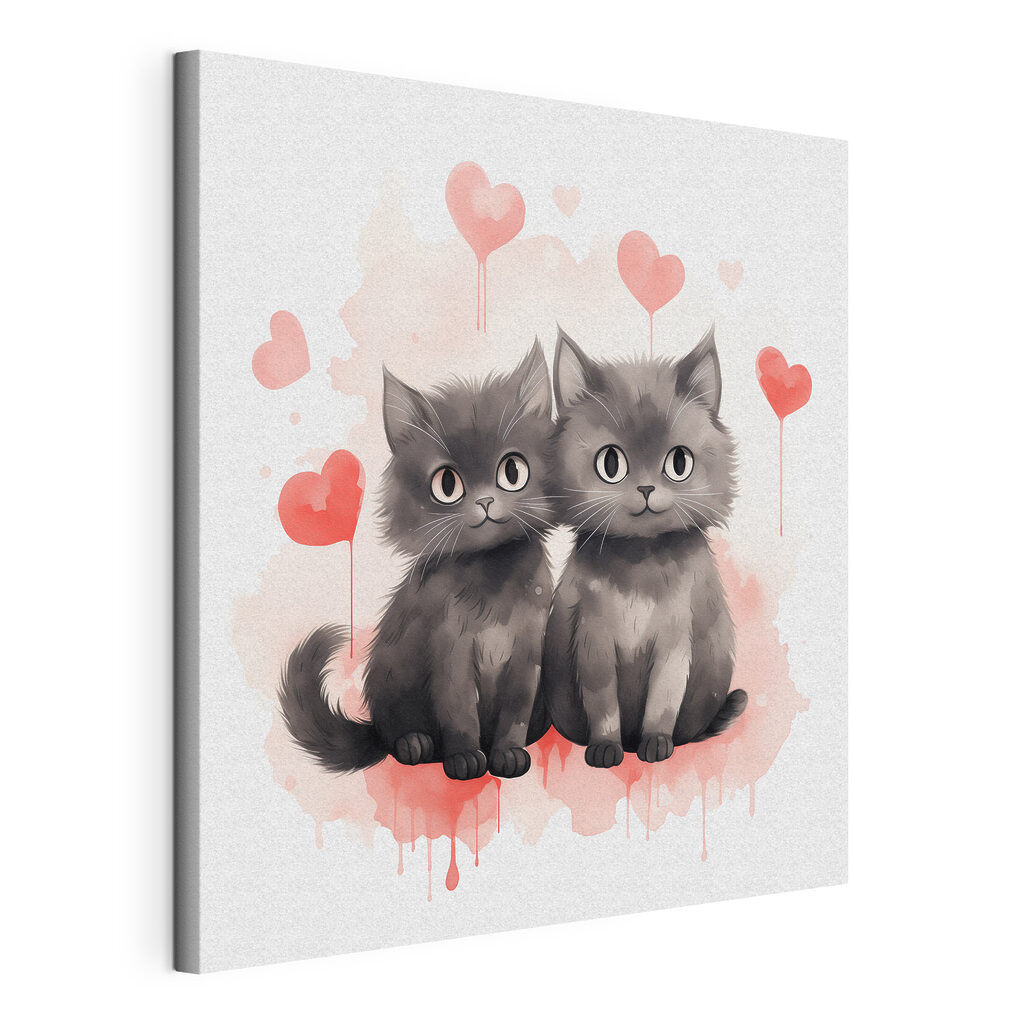 Two cats sitting next to each other