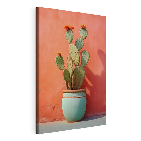 Canvas Schilderijen Cactus in een pot tegen een muur