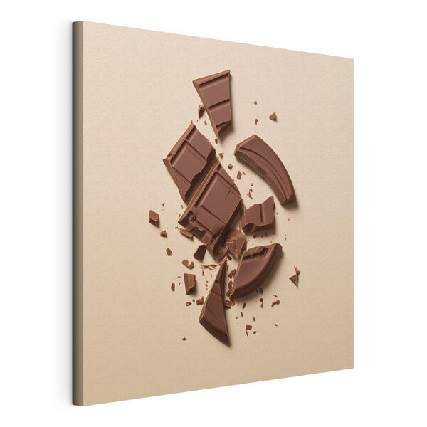 Gebroken chocoladereep op een roze oppervlak Canvas Schilderijen Gebroken chocoladereep op een roze oppervlak