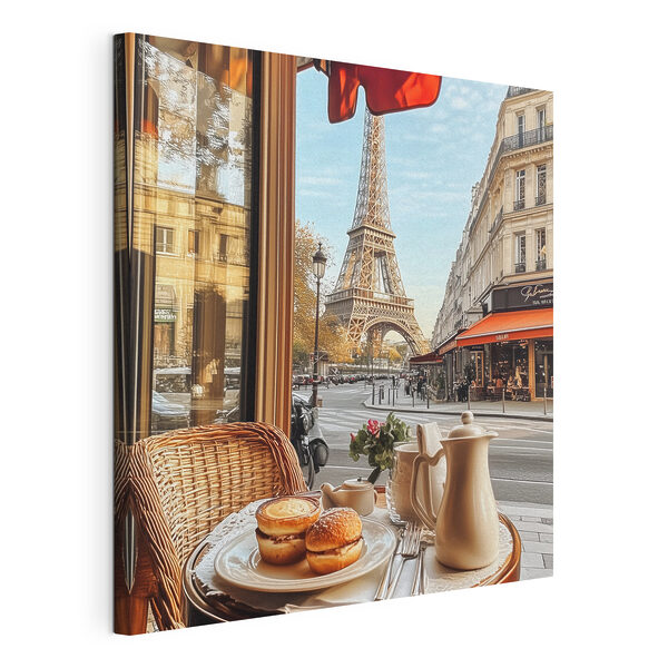 Table with food on it and a table with a tower in the background