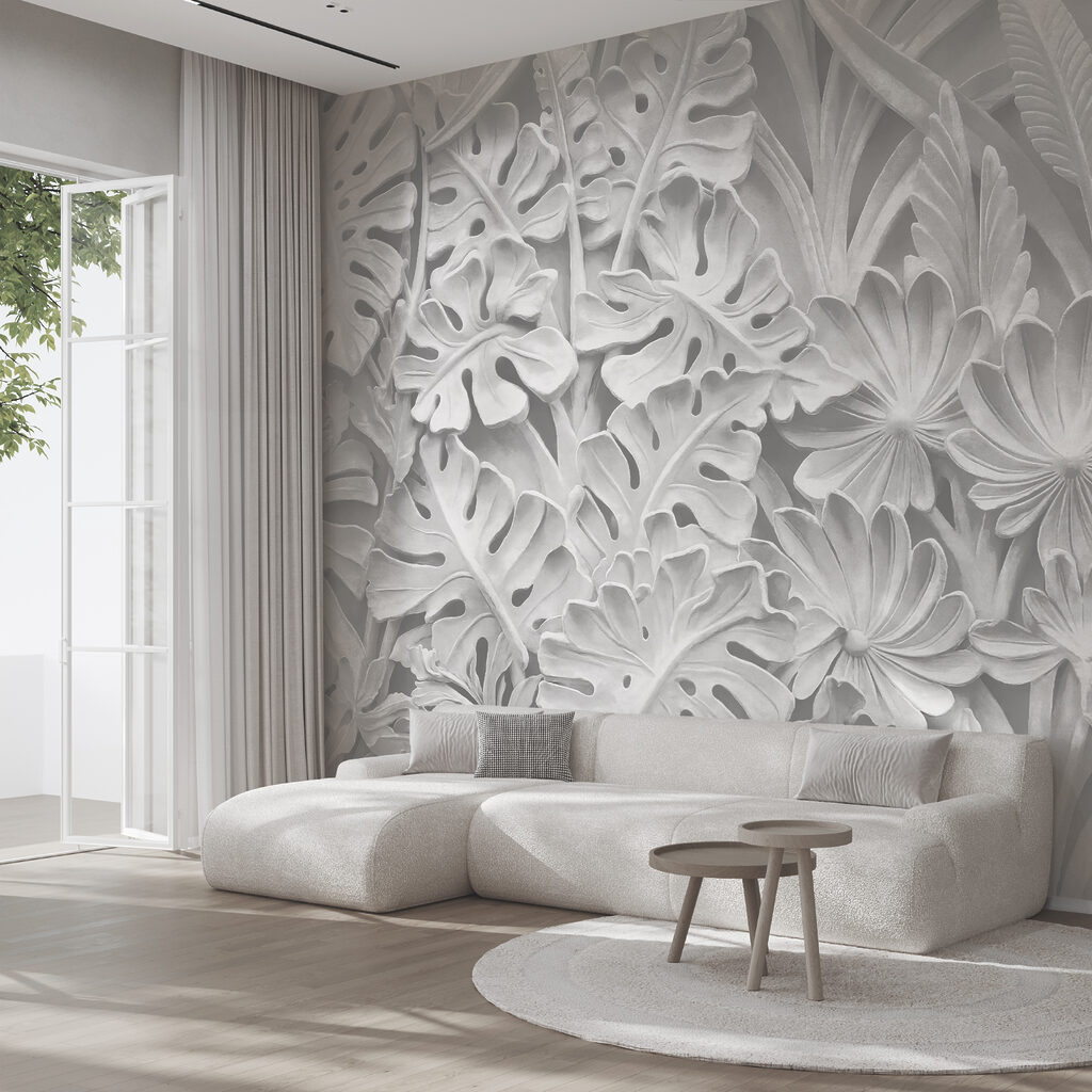 Witte muur met bloemen en bladeren