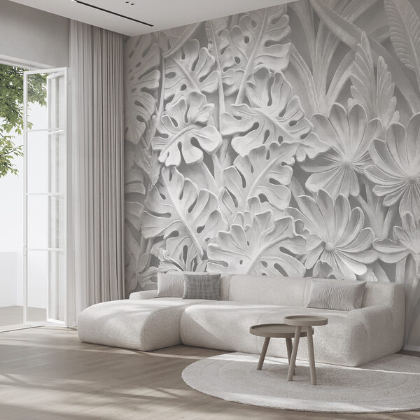 Witte muur met bloemen en bladeren