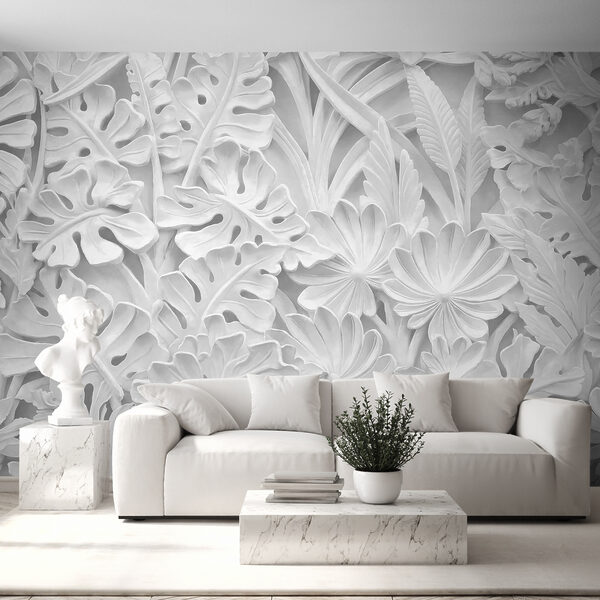 Witte muur met bloemen en bladeren