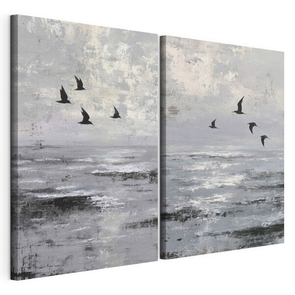 Modulaire canvasprint Een groep vogels die over het water vliegen